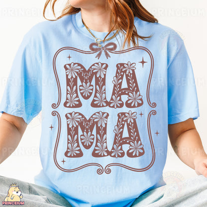 a woman wearing a t - shirt that says mamma