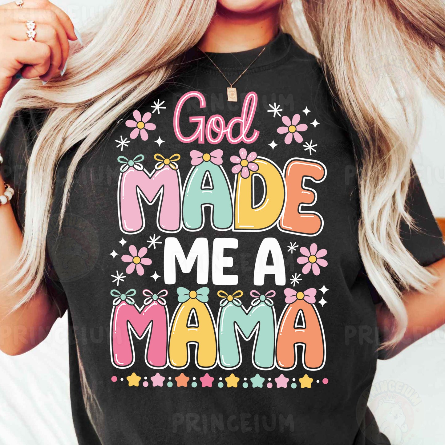 a woman wearing a black shirt that says god made me a mama