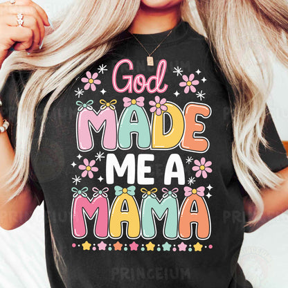a woman wearing a black shirt that says god made me a mama