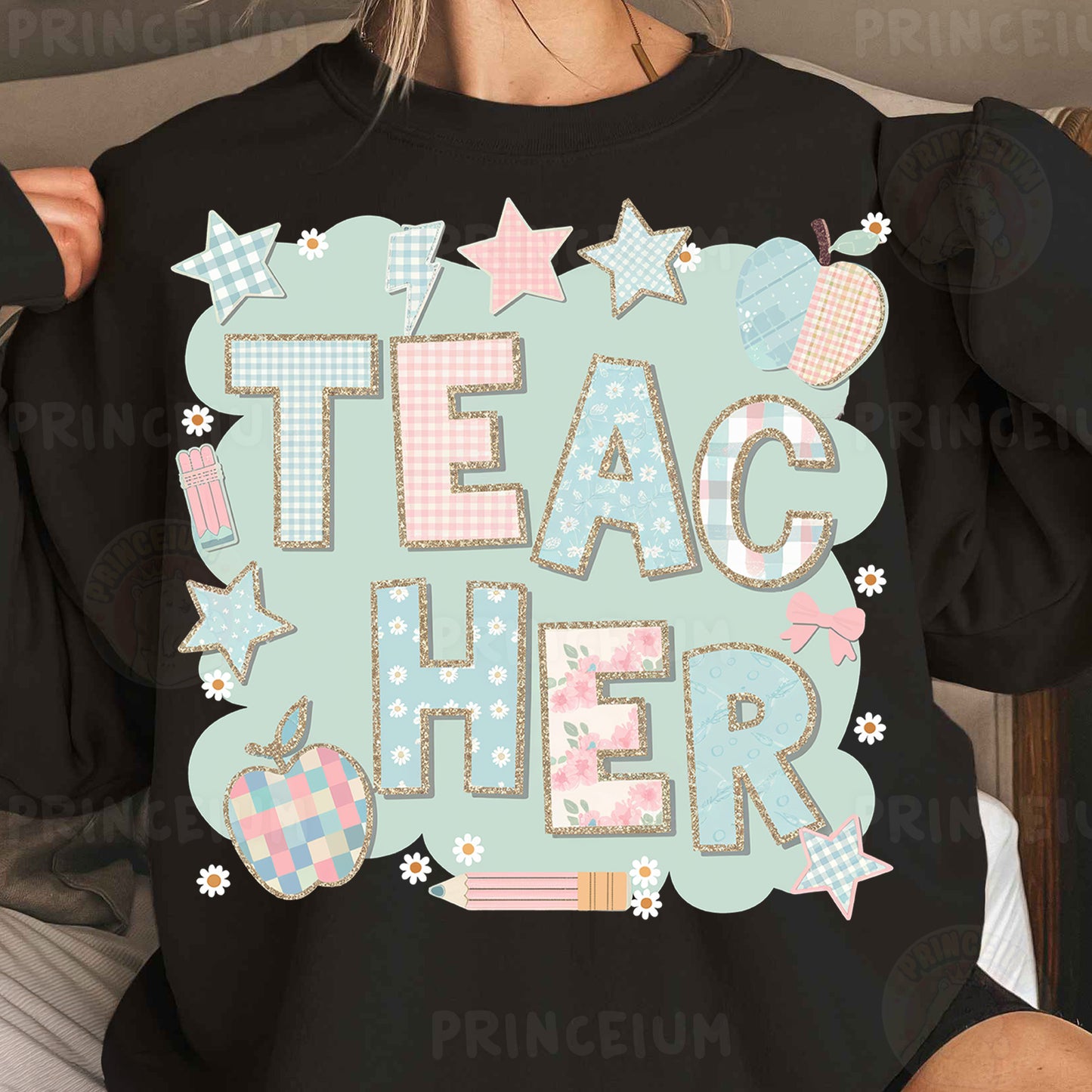 a woman wearing a black shirt that says teac cheer