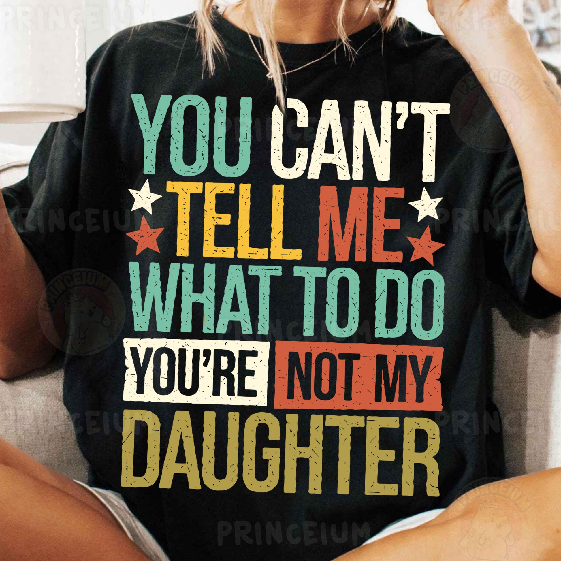 a woman wearing a t - shirt that says you can't tell me what