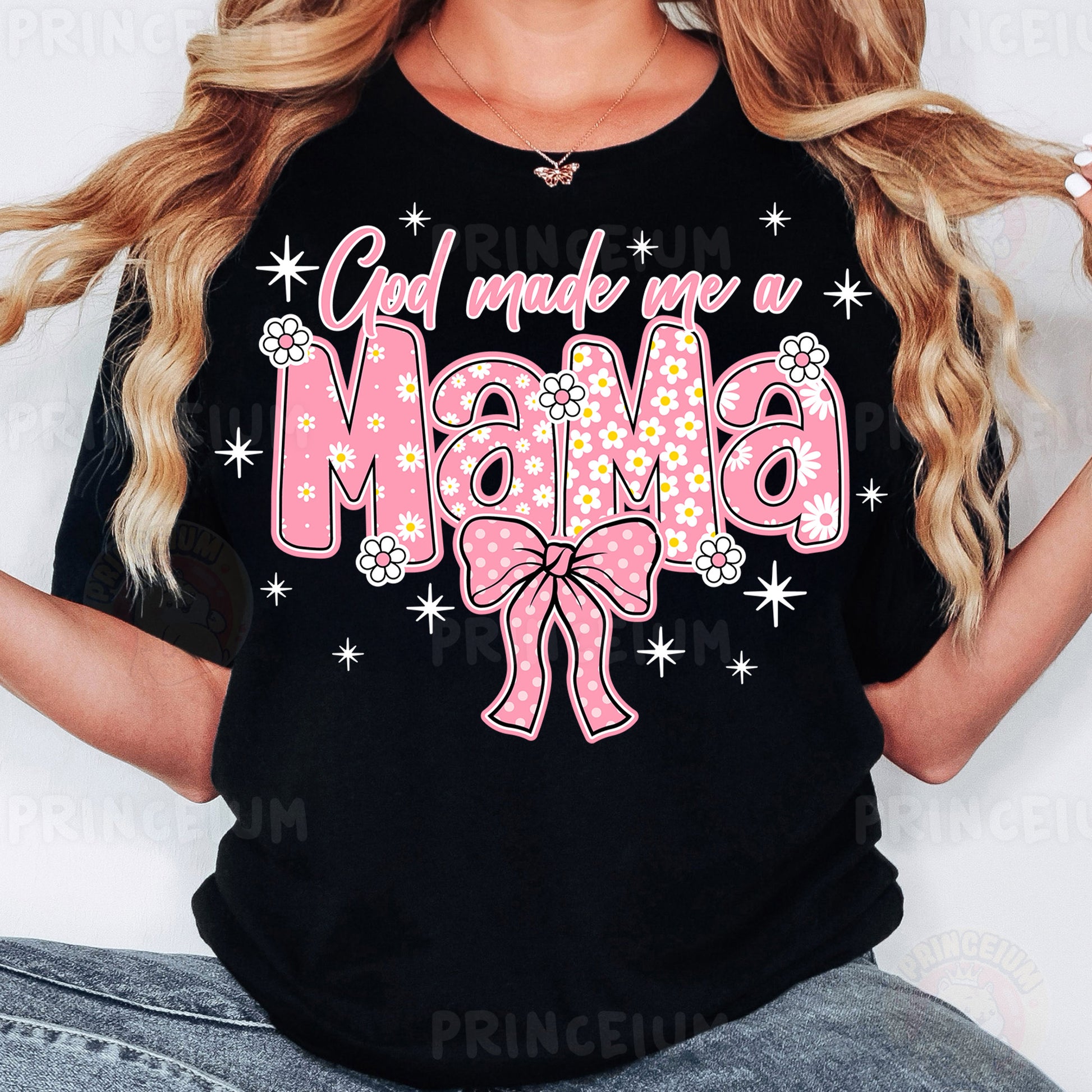 a woman wearing a black shirt with a pink bow