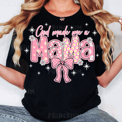 a woman wearing a black shirt with a pink bow