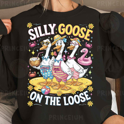 a woman wearing a black shirt that says silly goose on the loose