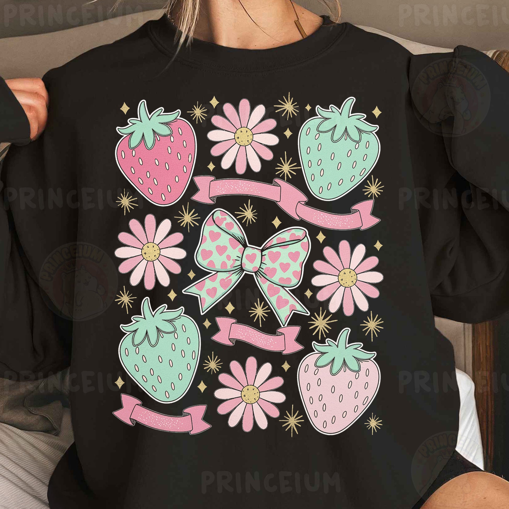a woman wearing a black shirt with pink and green bows and strawberries on it