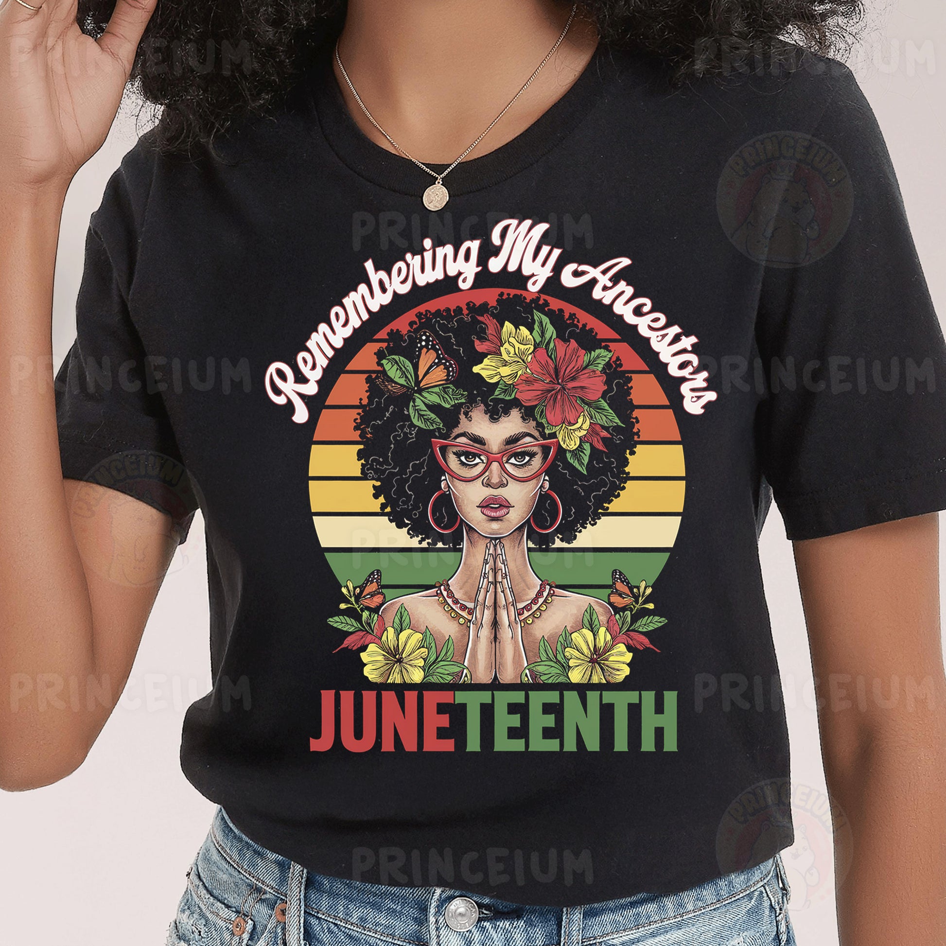 a woman wearing a black t - shirt with the words juneteeth on it