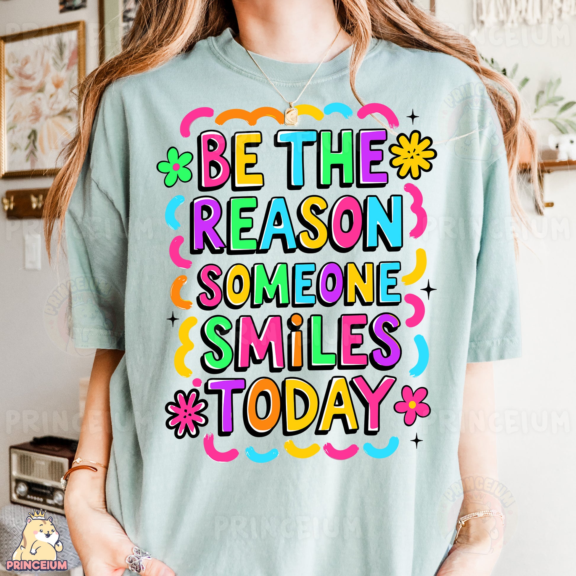 a woman wearing a t - shirt that says be the reason someone smiles today