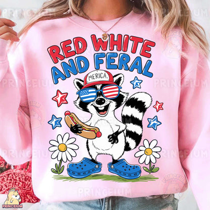 a woman wearing a pink shirt with a raccoon on it