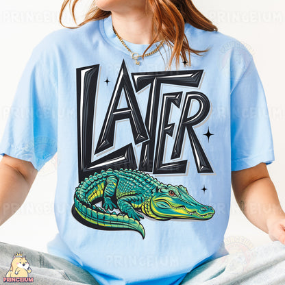 a woman wearing a blue shirt with a green alligator on it