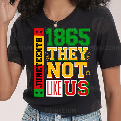 a woman wearing a black t - shirt that says, 1965 they not like us