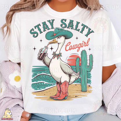 a woman wearing a white shirt with a duck wearing a cowboy hat