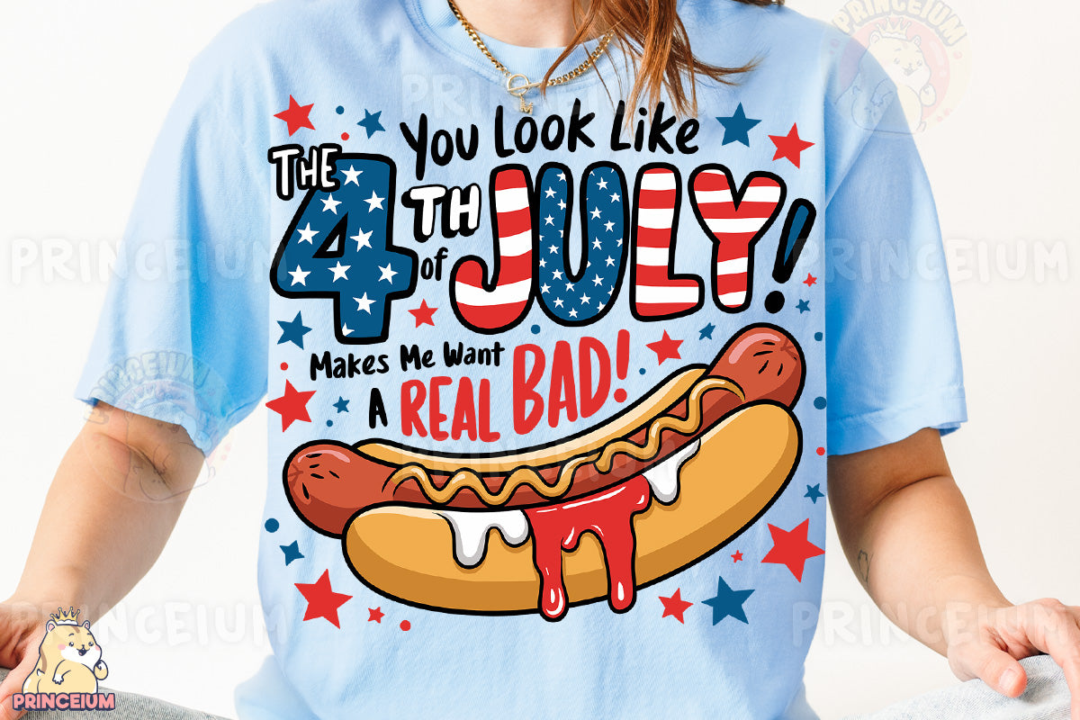 a woman wearing a fourth of july shirt with a hot dog on it