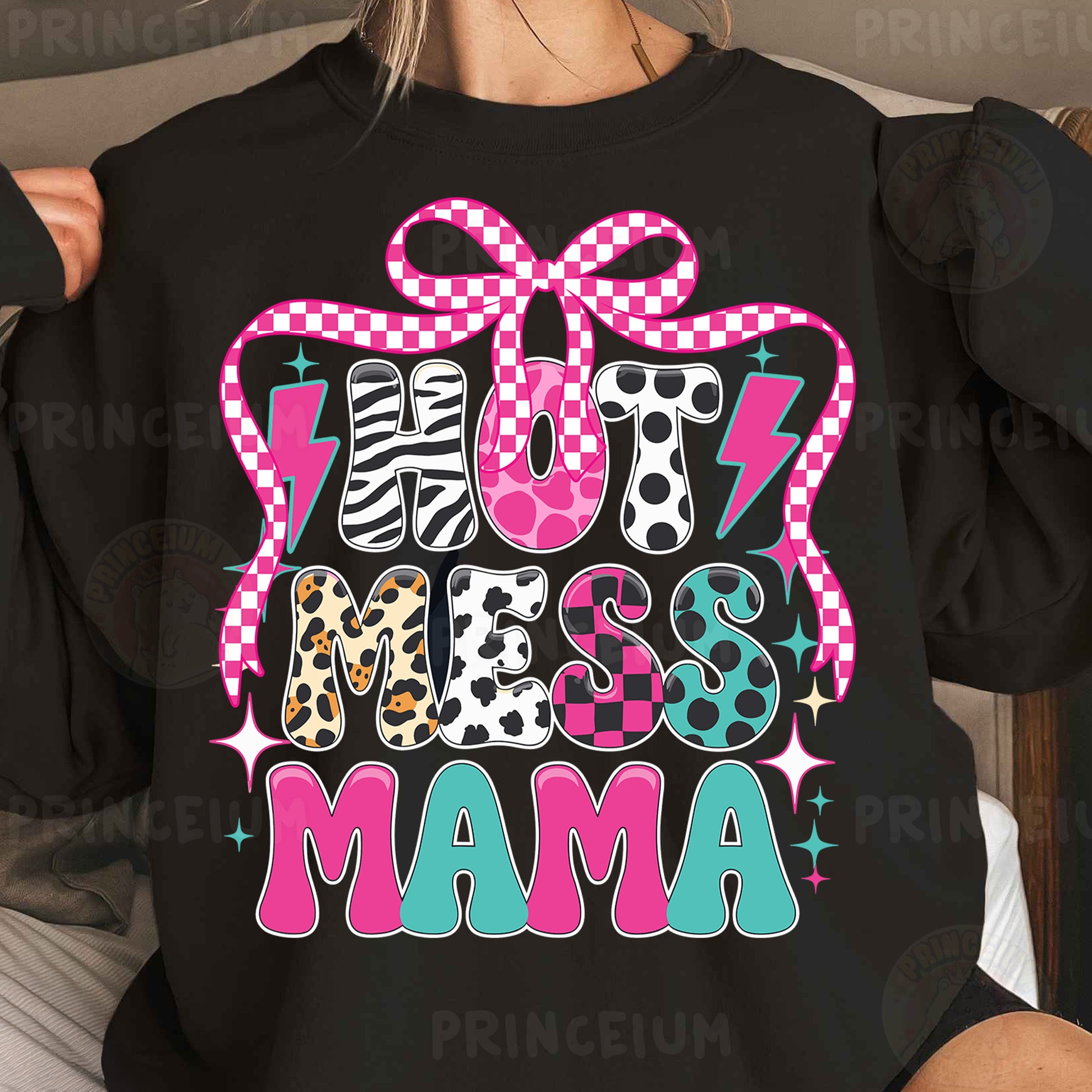 a woman wearing a black shirt with a pink bow on it