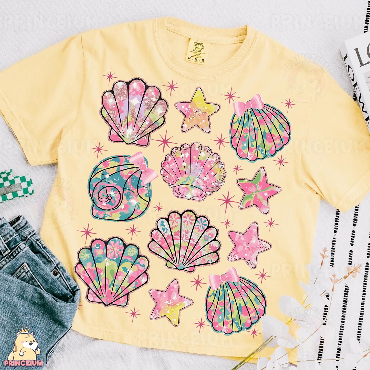 a t - shirt with seashells and stars on it