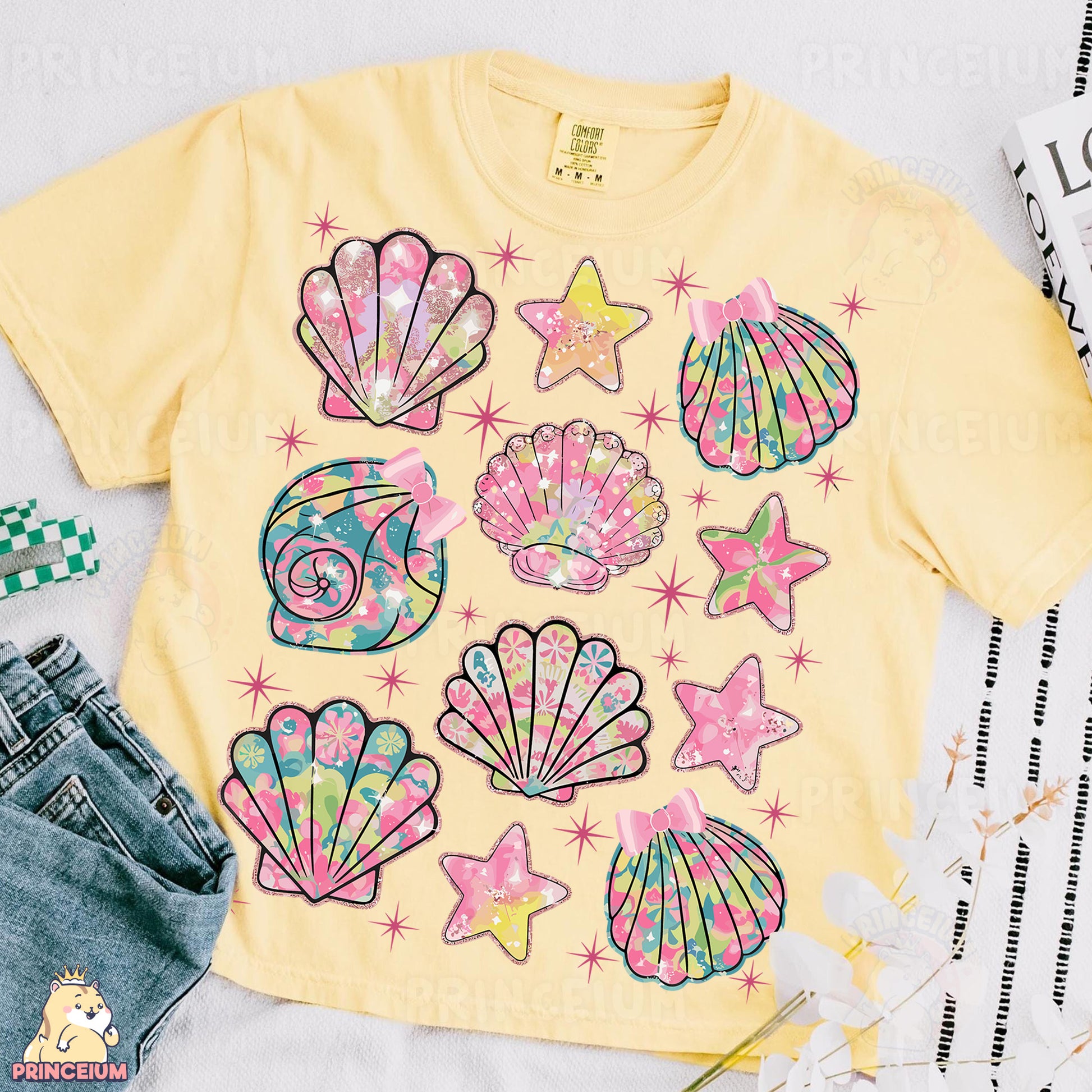 a t - shirt with seashells and stars on it