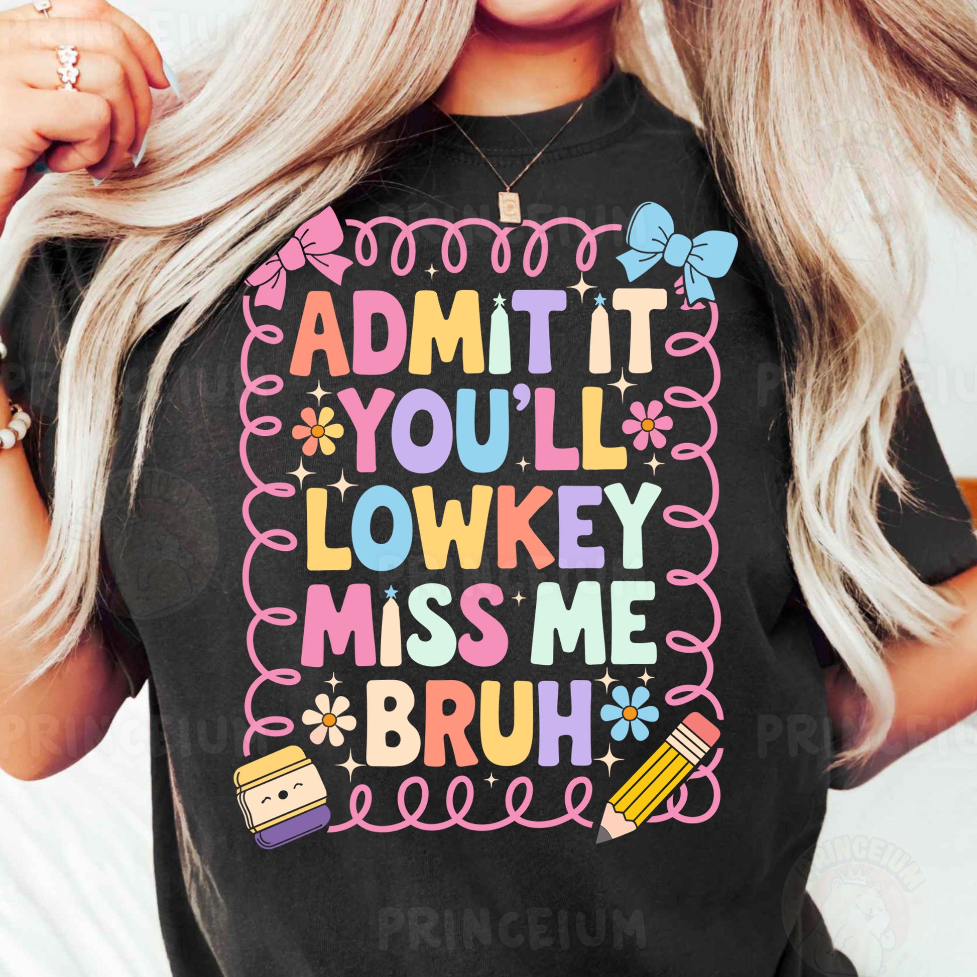 a woman wearing a black t - shirt that says admit it you'll '