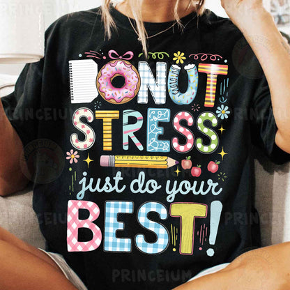 a woman sitting on a couch wearing a donut stress shirt