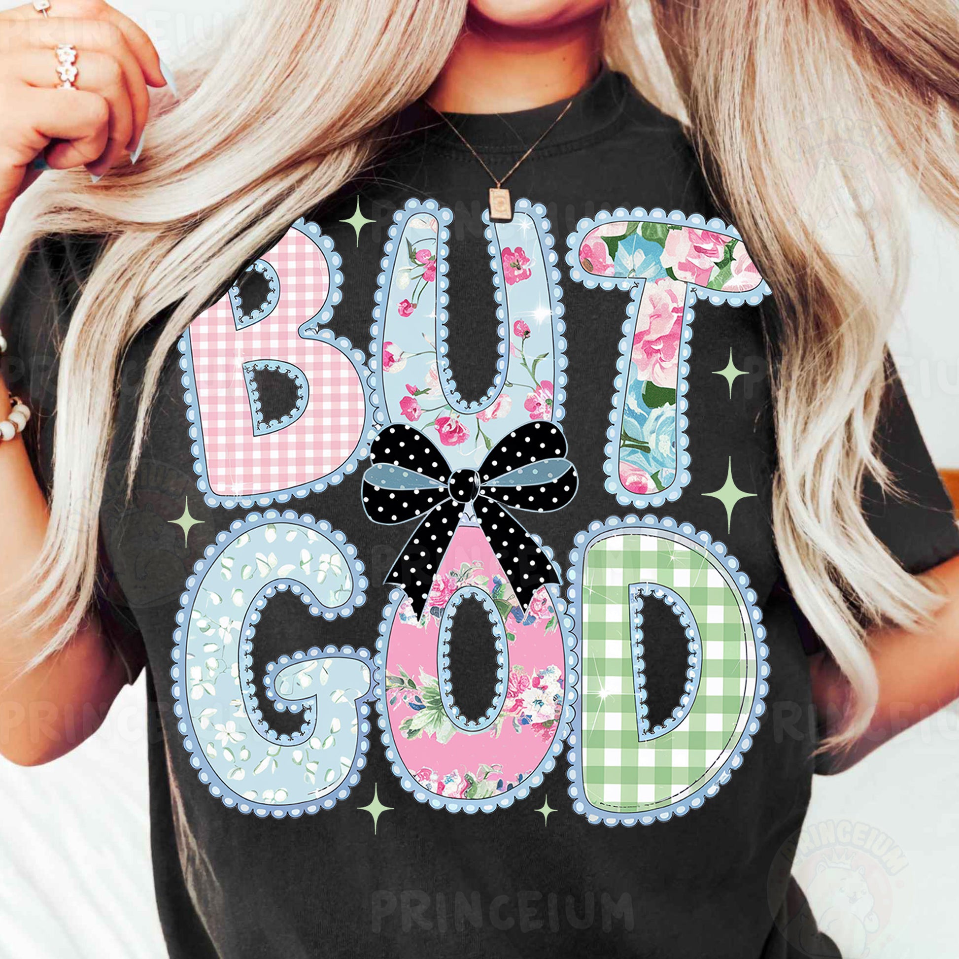 a woman wearing a black shirt that says but god