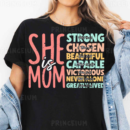 a woman wearing a black shirt that says she is a mom