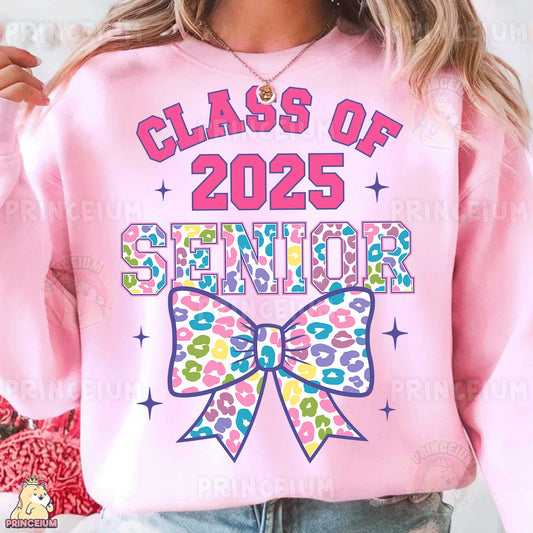 a woman wearing a pink sweatshirt with a bow on it