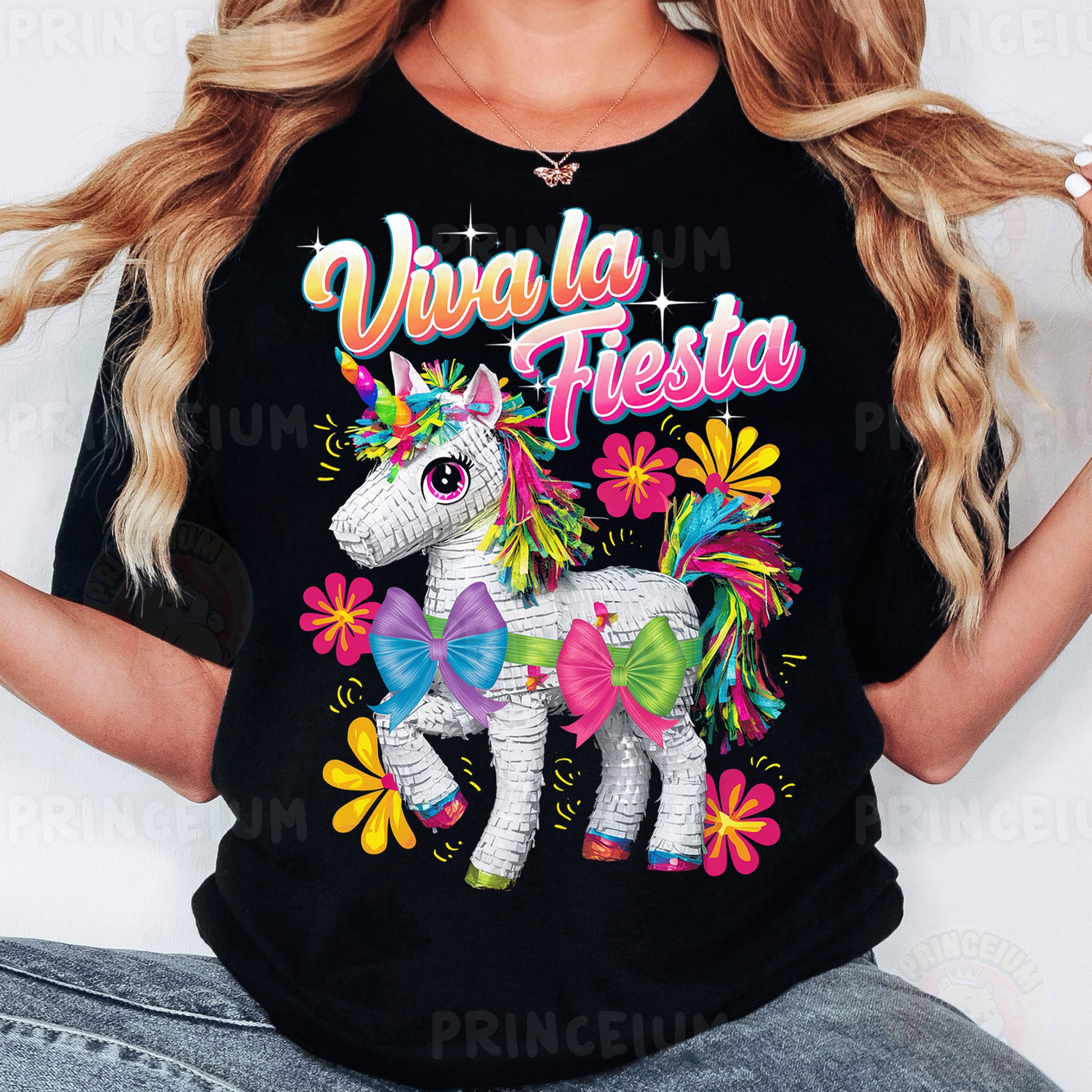 a woman wearing a black shirt with a unicorn on it
