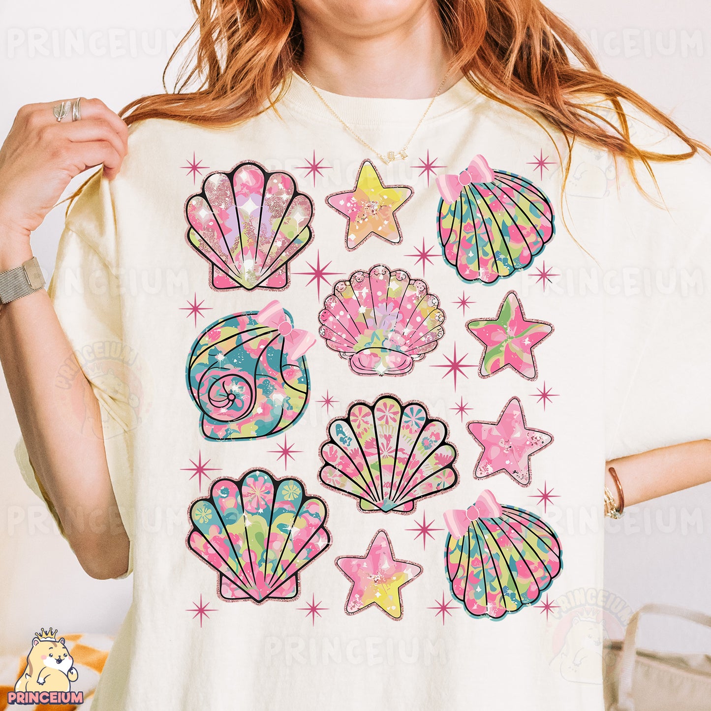 a woman wearing a t - shirt with a bunch of seashells on it