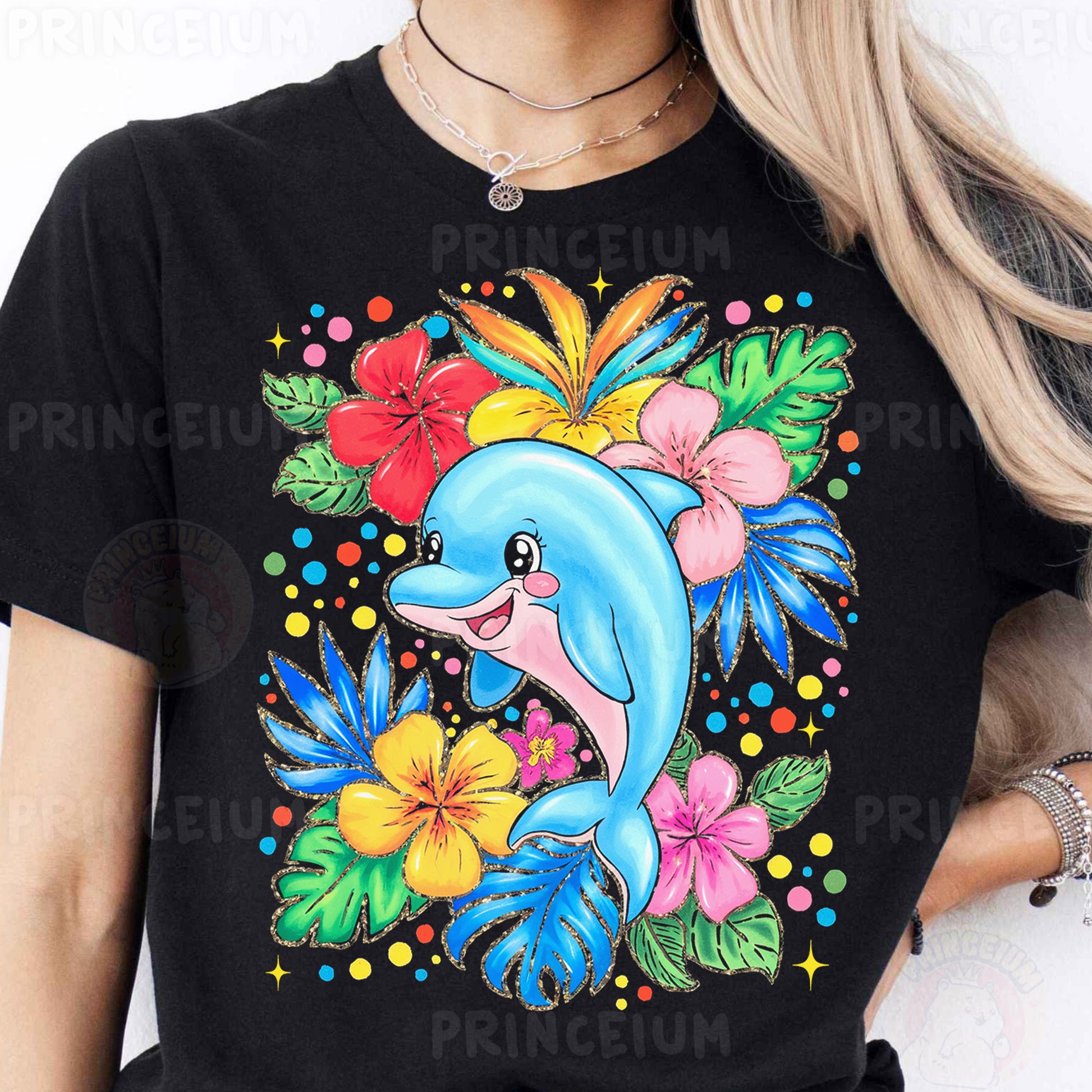 a woman wearing a black shirt with a dolphin and flowers on it