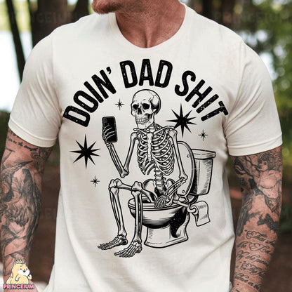 a man wearing a white shirt with a skeleton sitting on a toilet