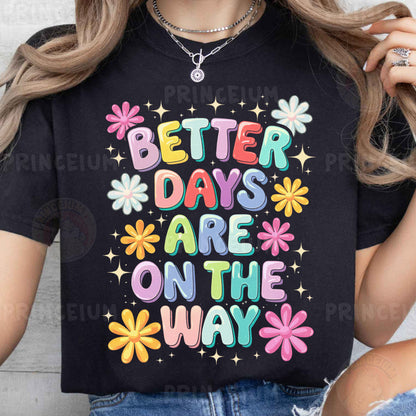 a woman wearing a t - shirt that says better days are on the way