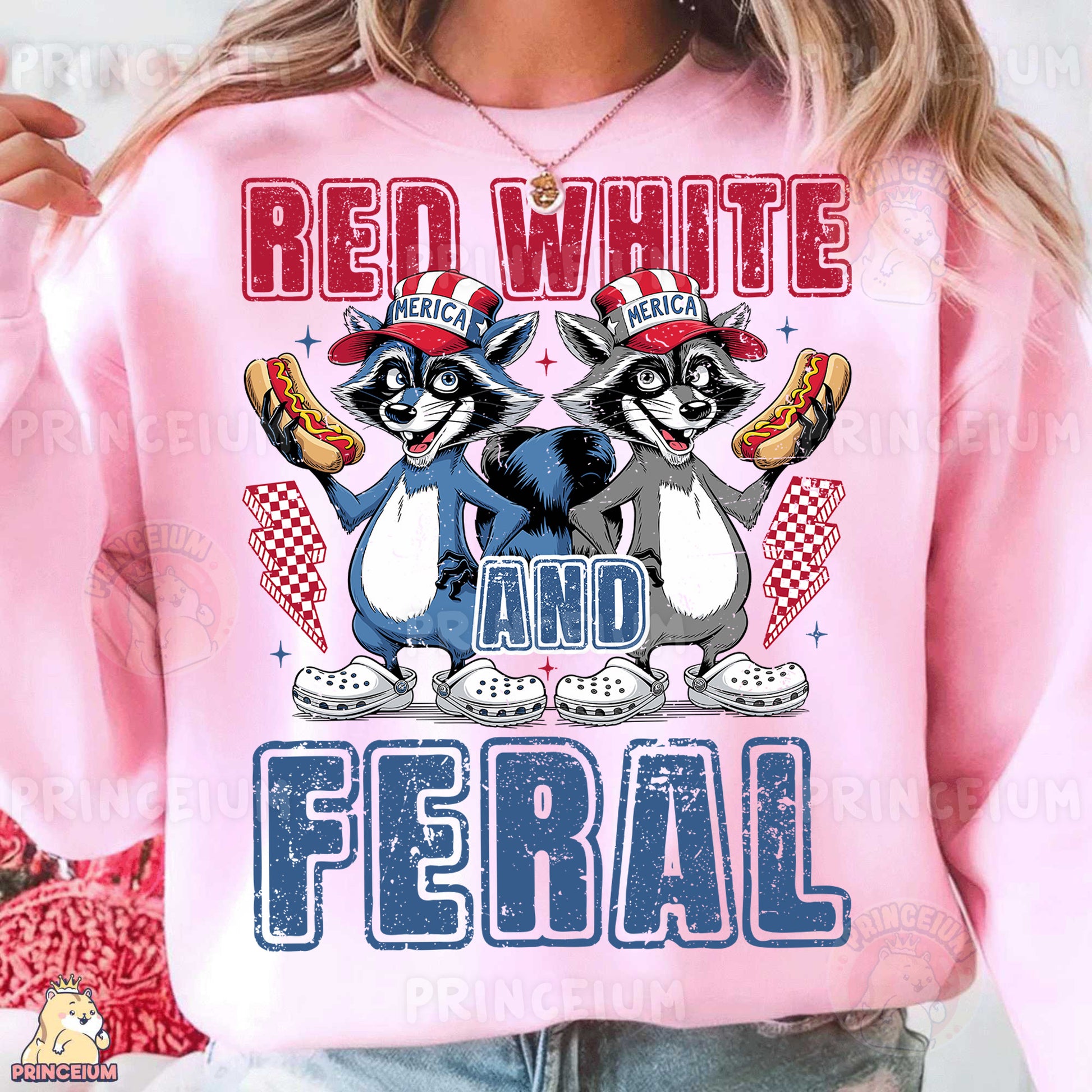 a woman wearing a pink shirt with two raccoons on it