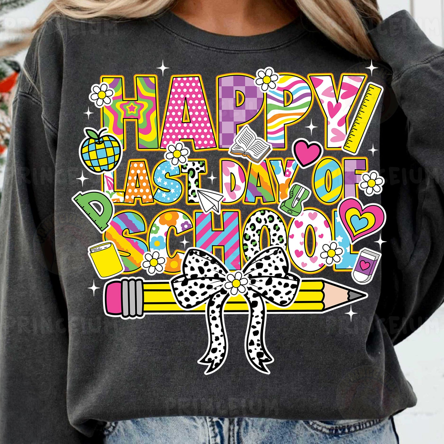 a woman wearing a black happy birthday sweatshirt