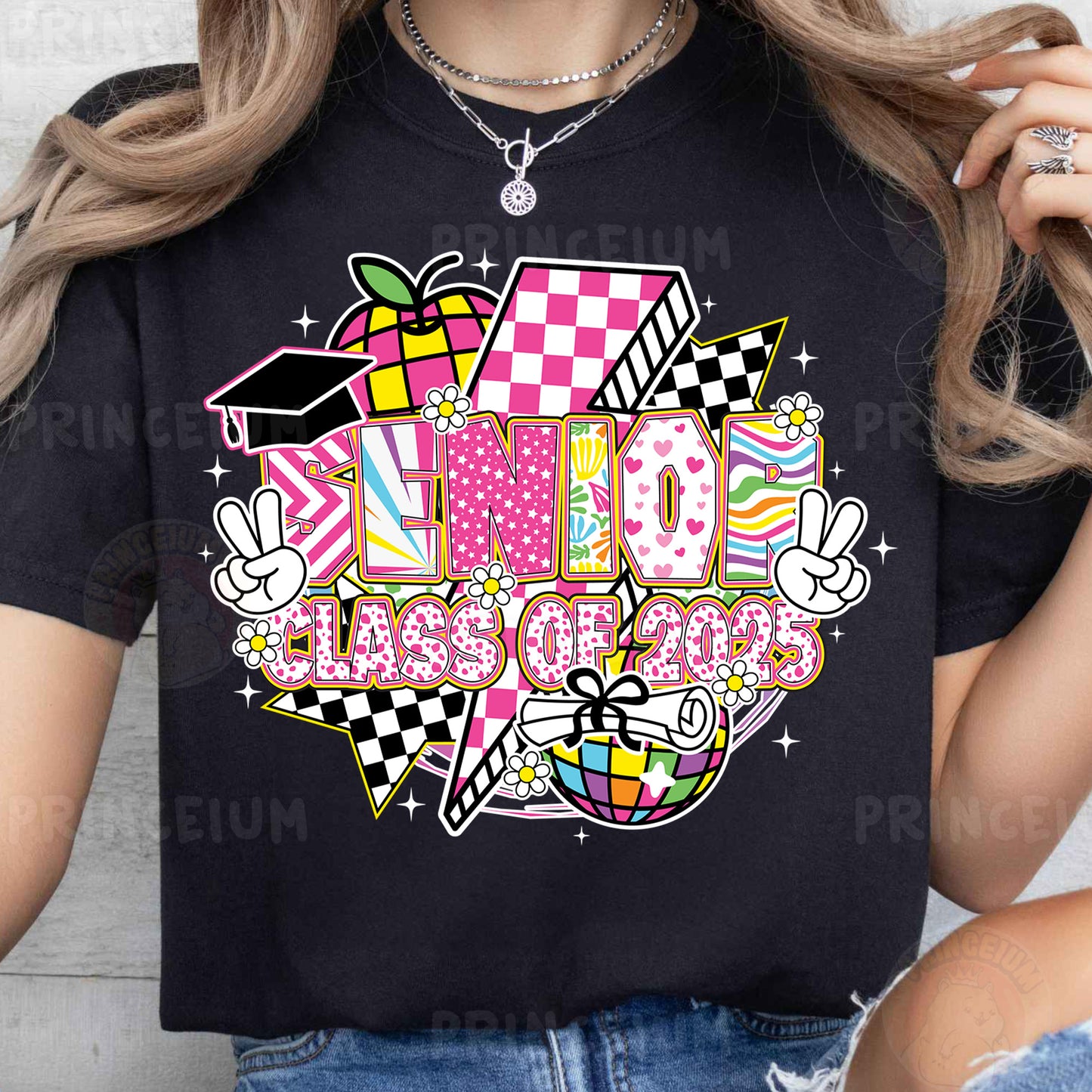 a woman wearing a black shirt with a pink and yellow checkered design