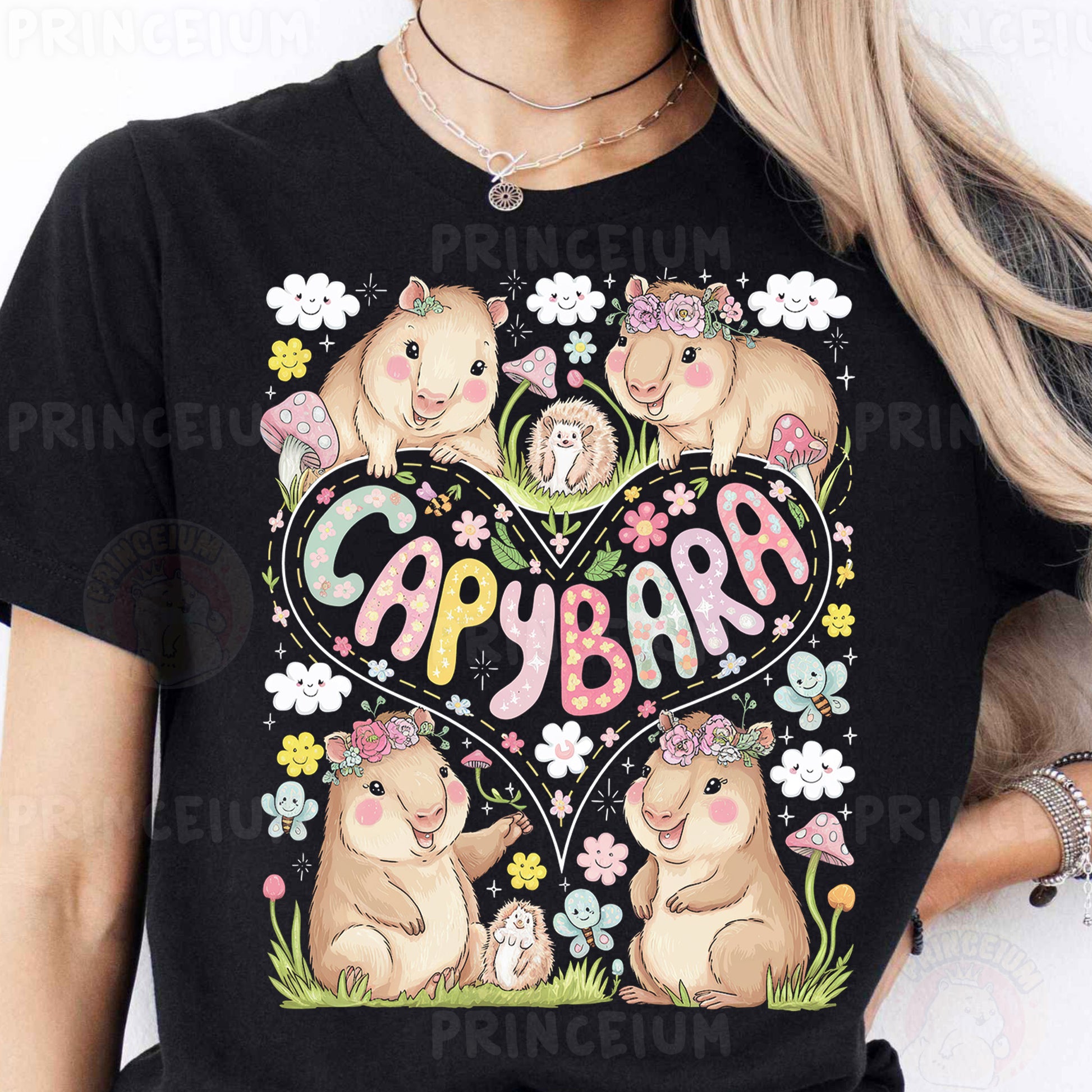 a woman wearing a black t - shirt with a picture of a couple of bears