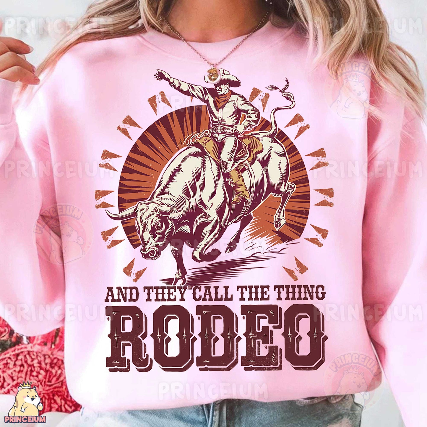 a woman wearing a pink shirt that says rodeo and they call the thing rodeo