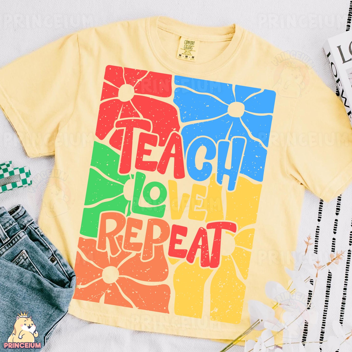 a t - shirt with the words teach love repeat on it