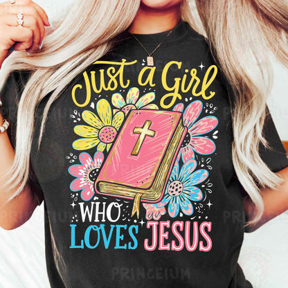 a woman wearing a t - shirt that says just a girl who loves jesus