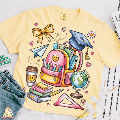 a yellow shirt with a picture of a backpack and books