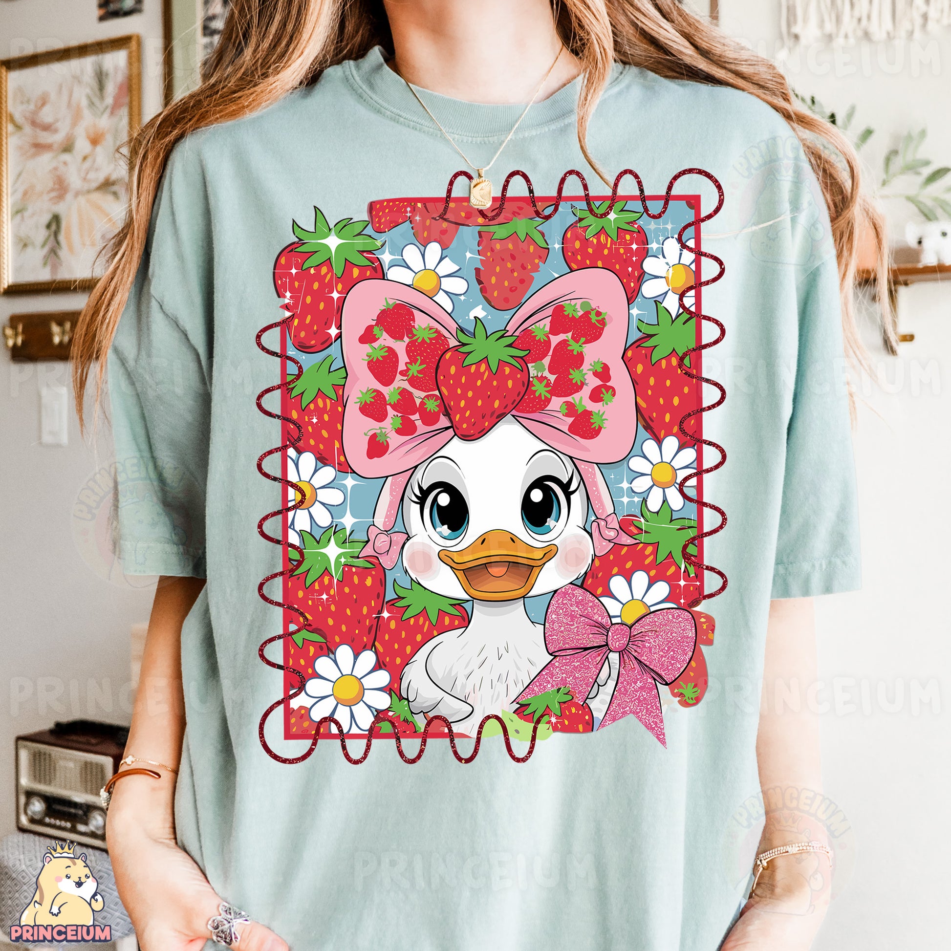 a woman wearing a t - shirt with a picture of a duck wearing a bow