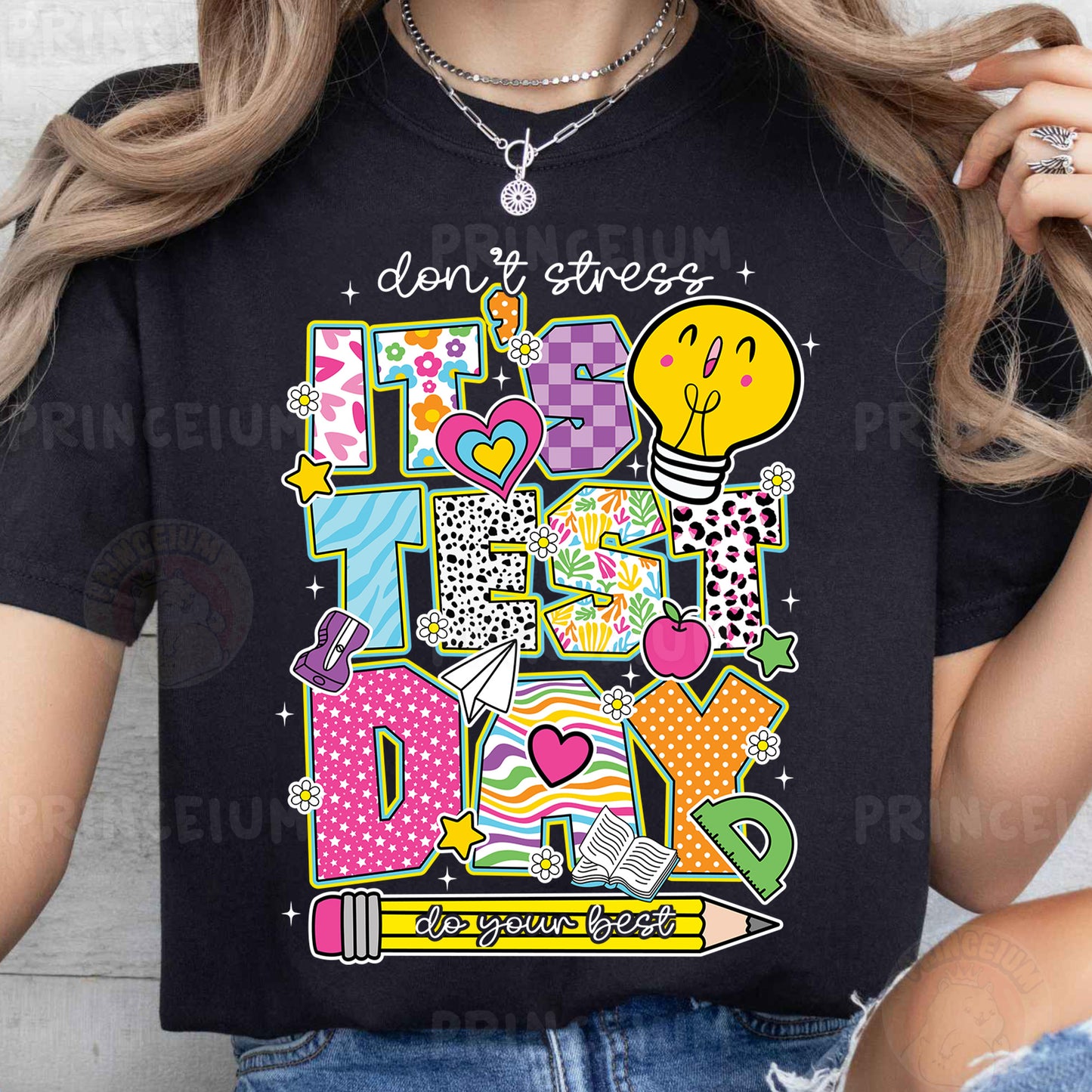 a woman wearing a black t - shirt that says don't forget