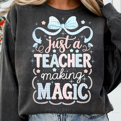 a woman wearing a sweatshirt that says just a teacher making magic