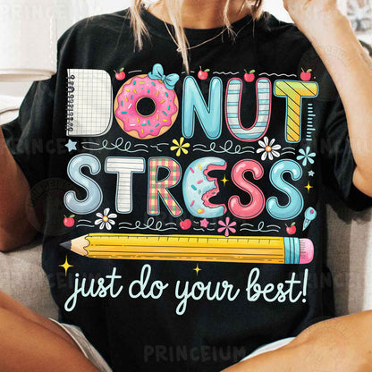 a woman sitting on a couch wearing a donut stress shirt