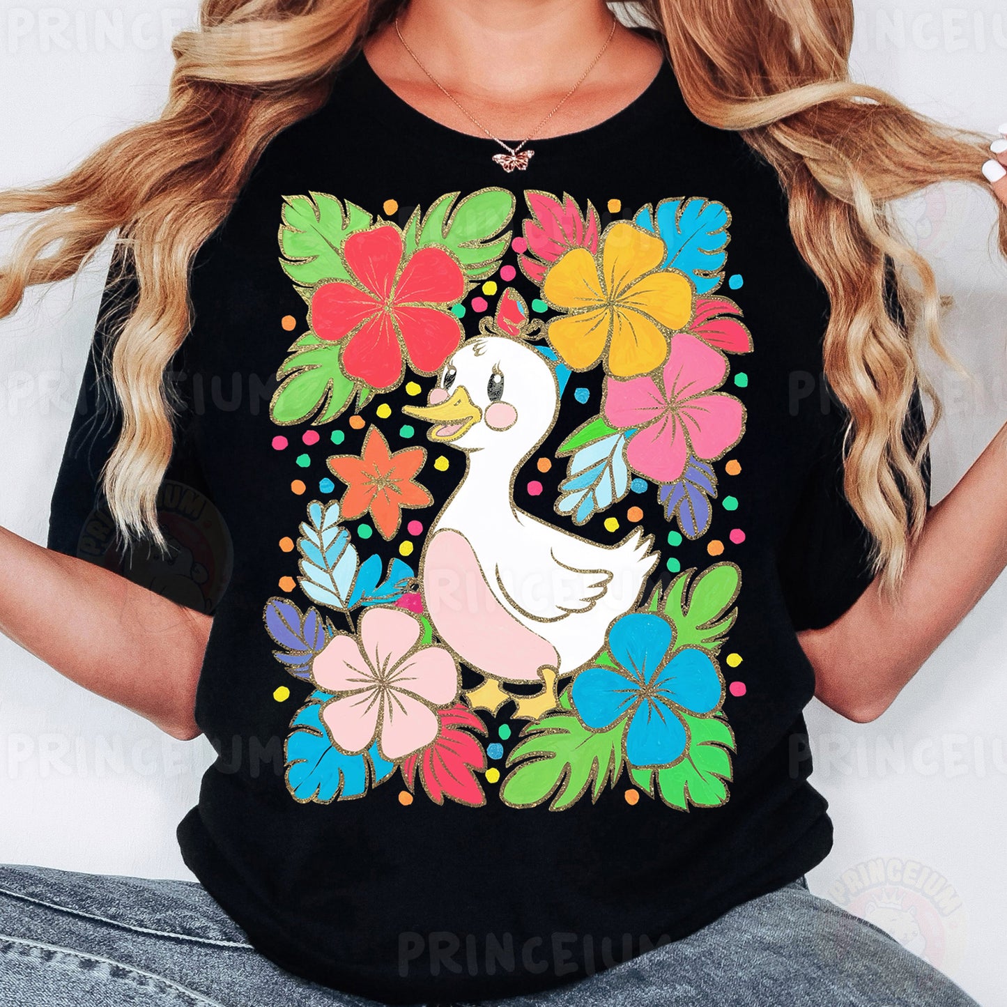 a woman wearing a black shirt with a duck and flowers on it