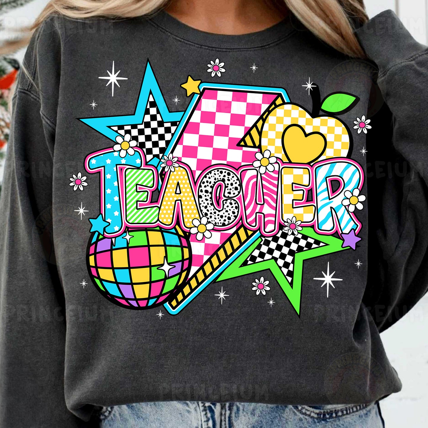 a woman wearing a black shirt with the word tamer on it