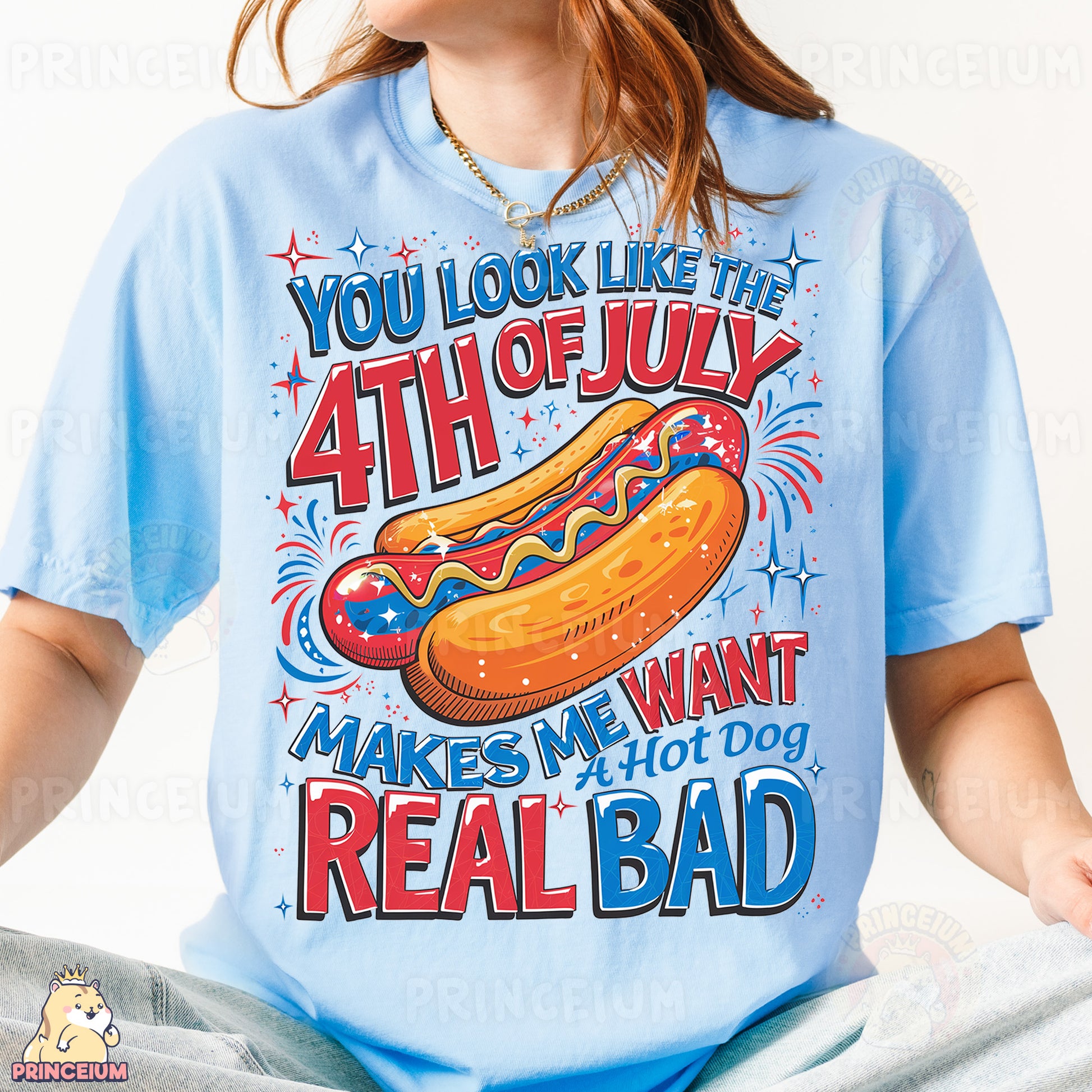 a woman wearing a blue shirt with a hot dog on it