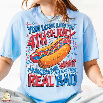 a woman wearing a blue shirt with a hot dog on it