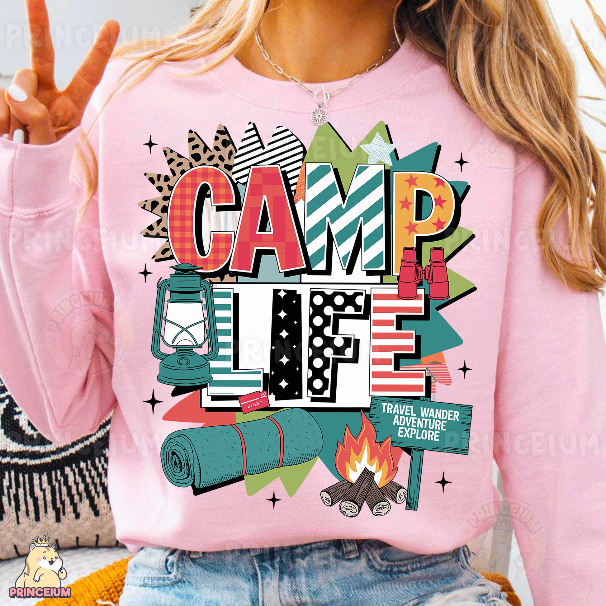 a woman wearing a pink shirt that says camp life