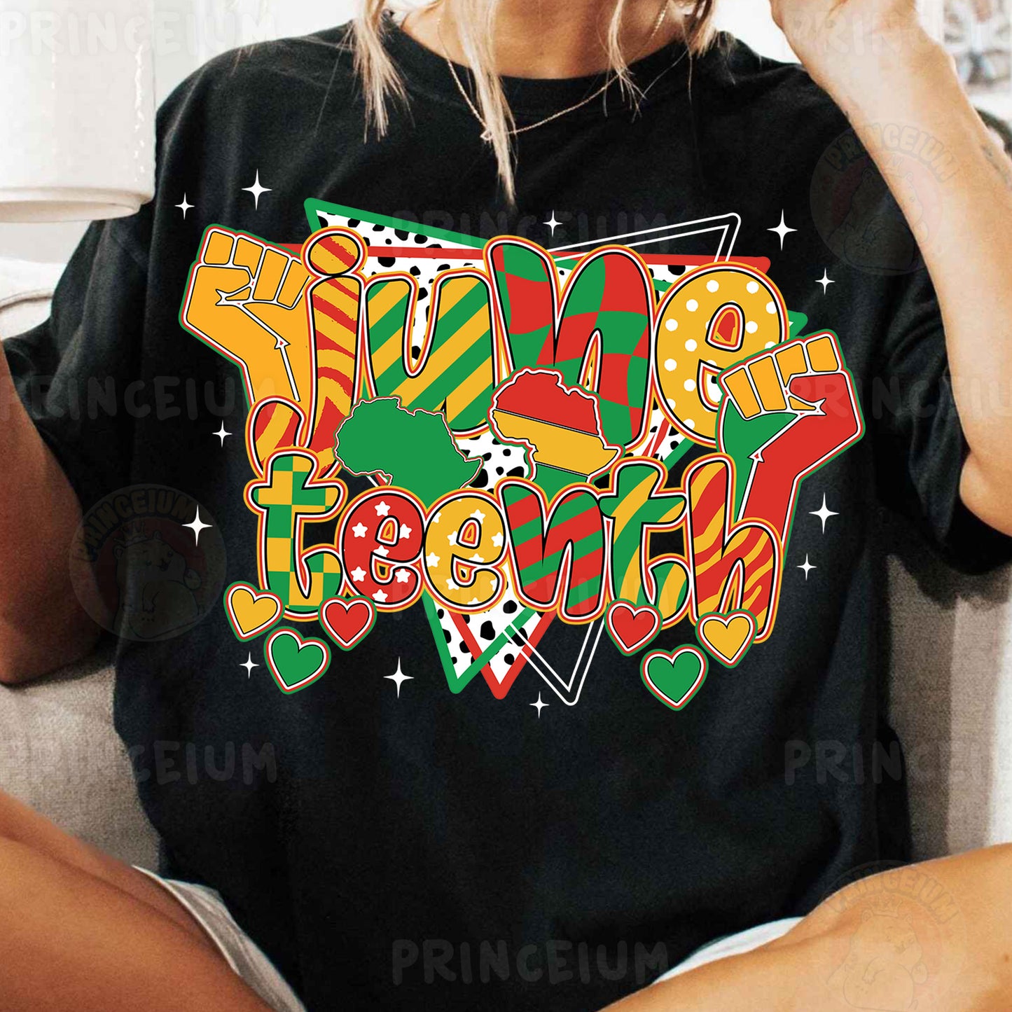 a woman sitting on a couch wearing a black shirt