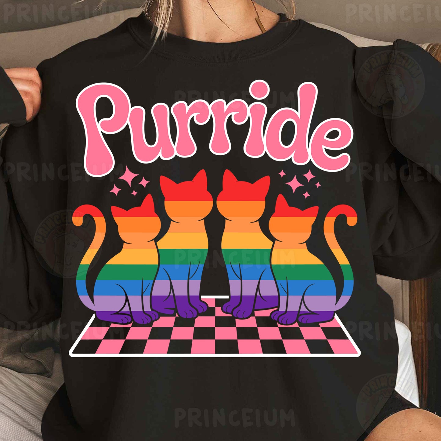 a woman wearing a black shirt with two cats on it