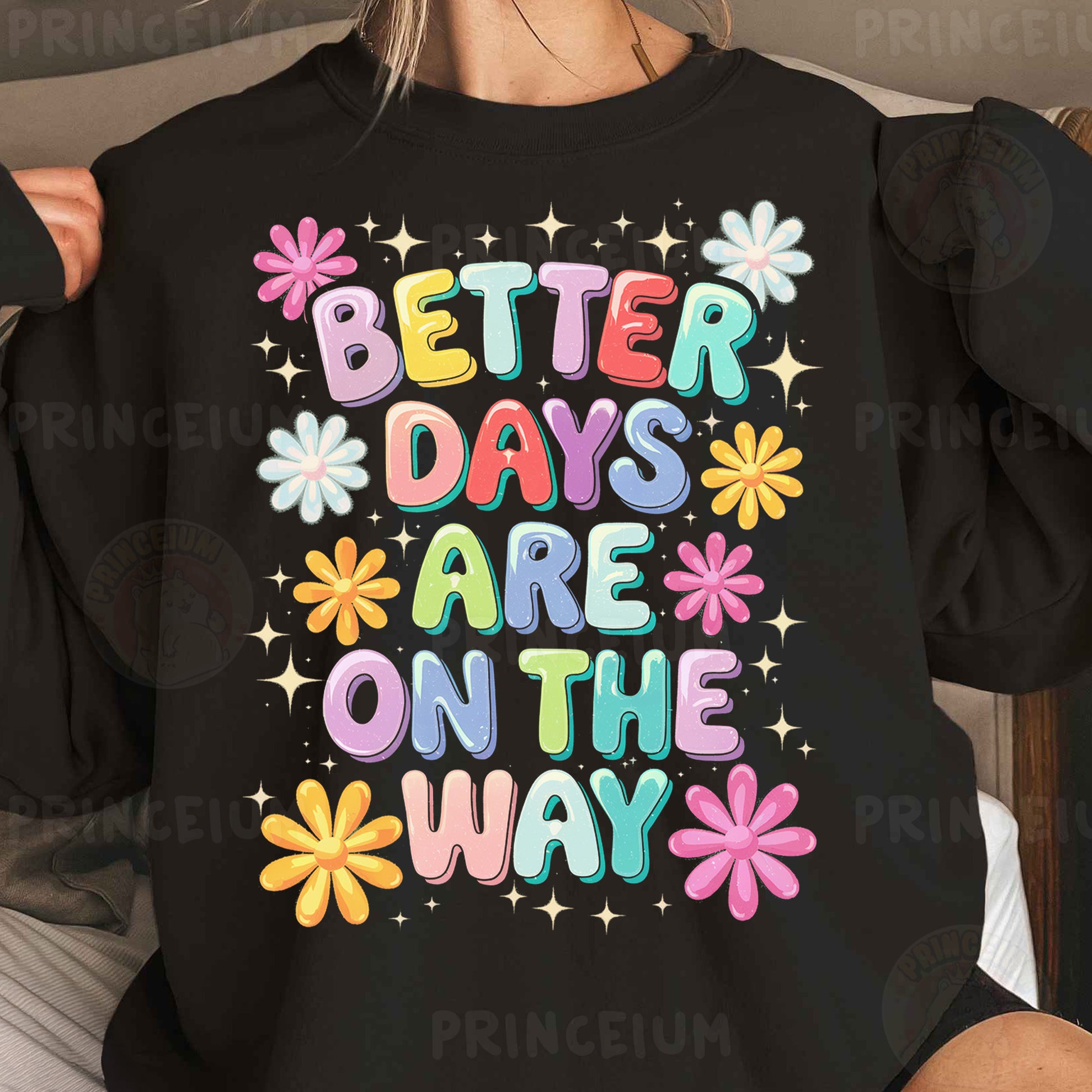 a woman wearing a black sweatshirt that says better days are on the way