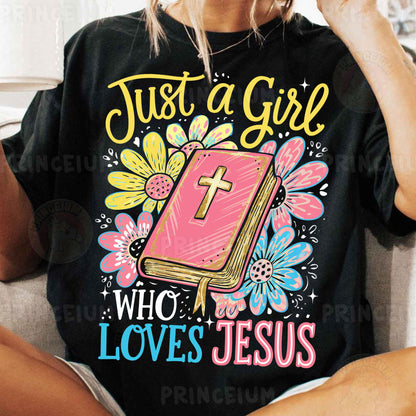a woman sitting on a couch wearing a t - shirt that says just a girl